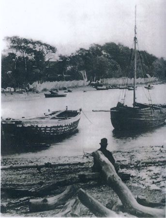 Copy of an undated photograph taken looking across Guildford Pill to Parsons Wood at Llangwm Pembrokeshire